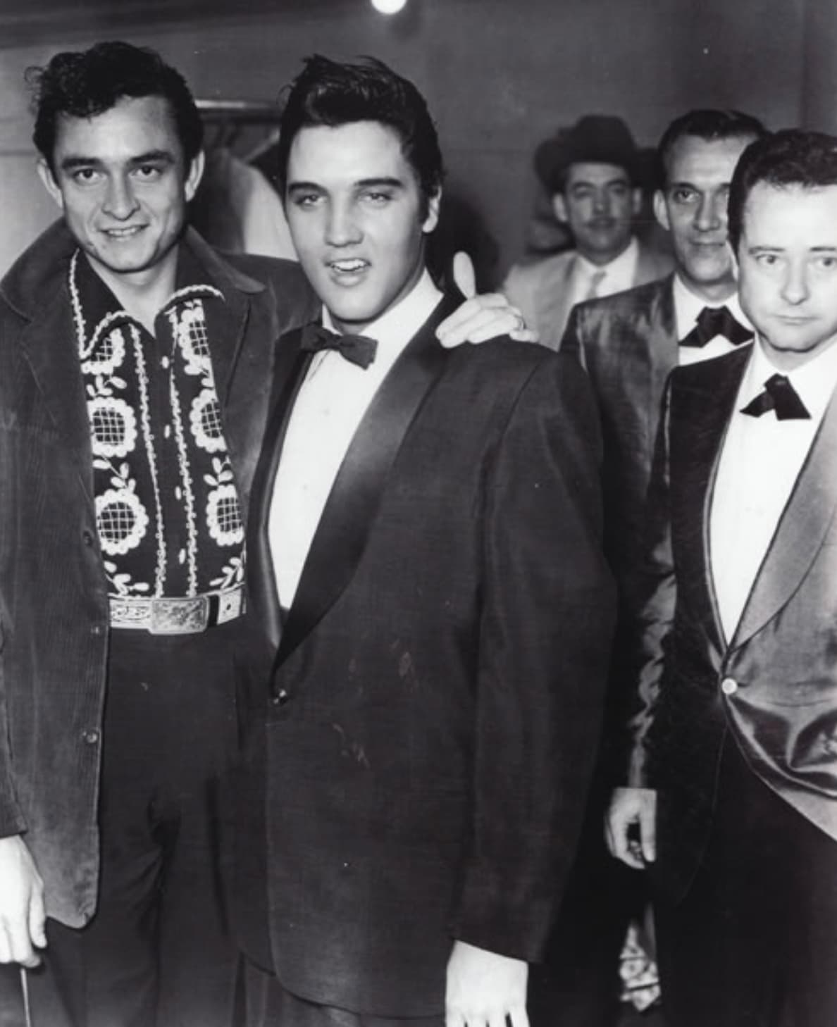 “Elvis visiting Backstage at The 950th Grand Ole Opry Christmas show: 21st December 1957 8.30pm - 9.00pm Network: NBC radio.”